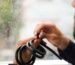 Technician holding a flexible cable Ireland solution, inspecting a durable black electrical cable with exposed internal wiring for industrial and commercial applications.